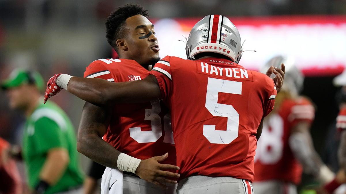 Ohio State running back Dallan Hayden (No. 5) celebrates a touchdown run against the Maryland Terrapins